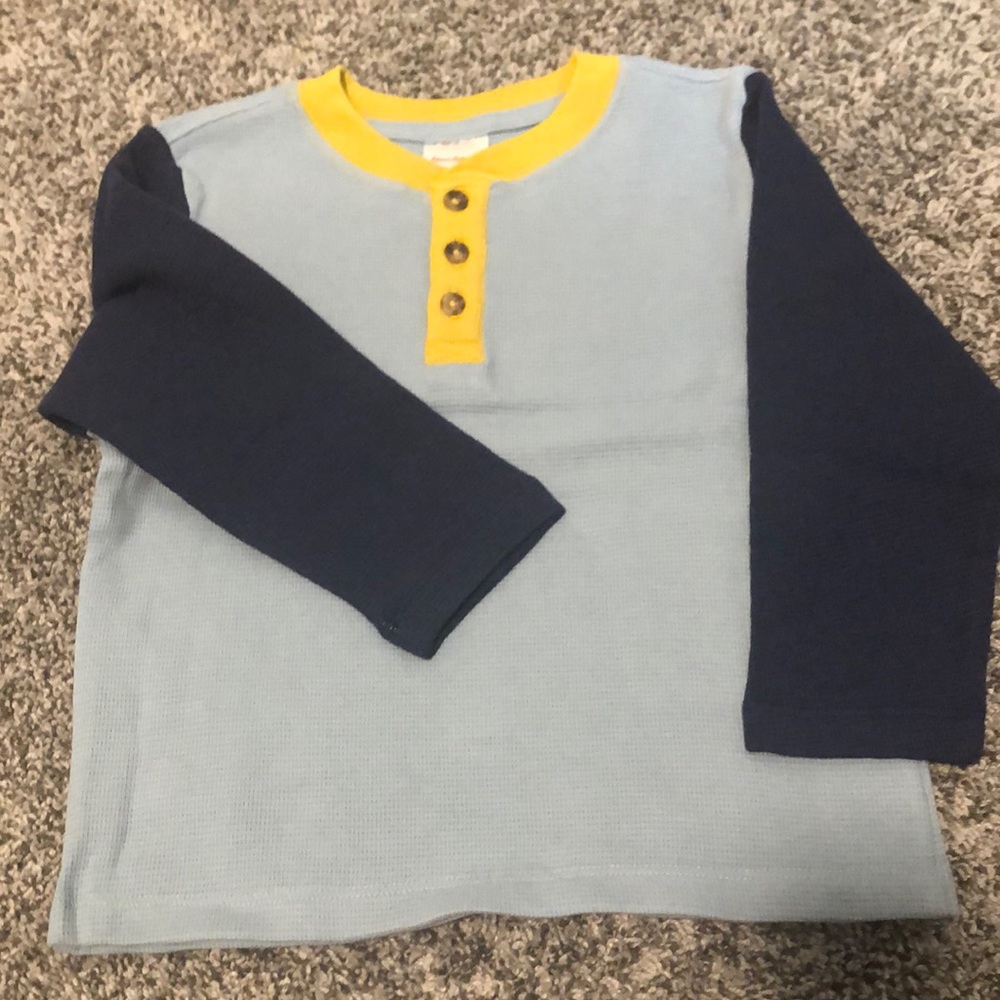 Colorblock thermal Henley. Colors dark navy, light dusty blue and mustard yellow